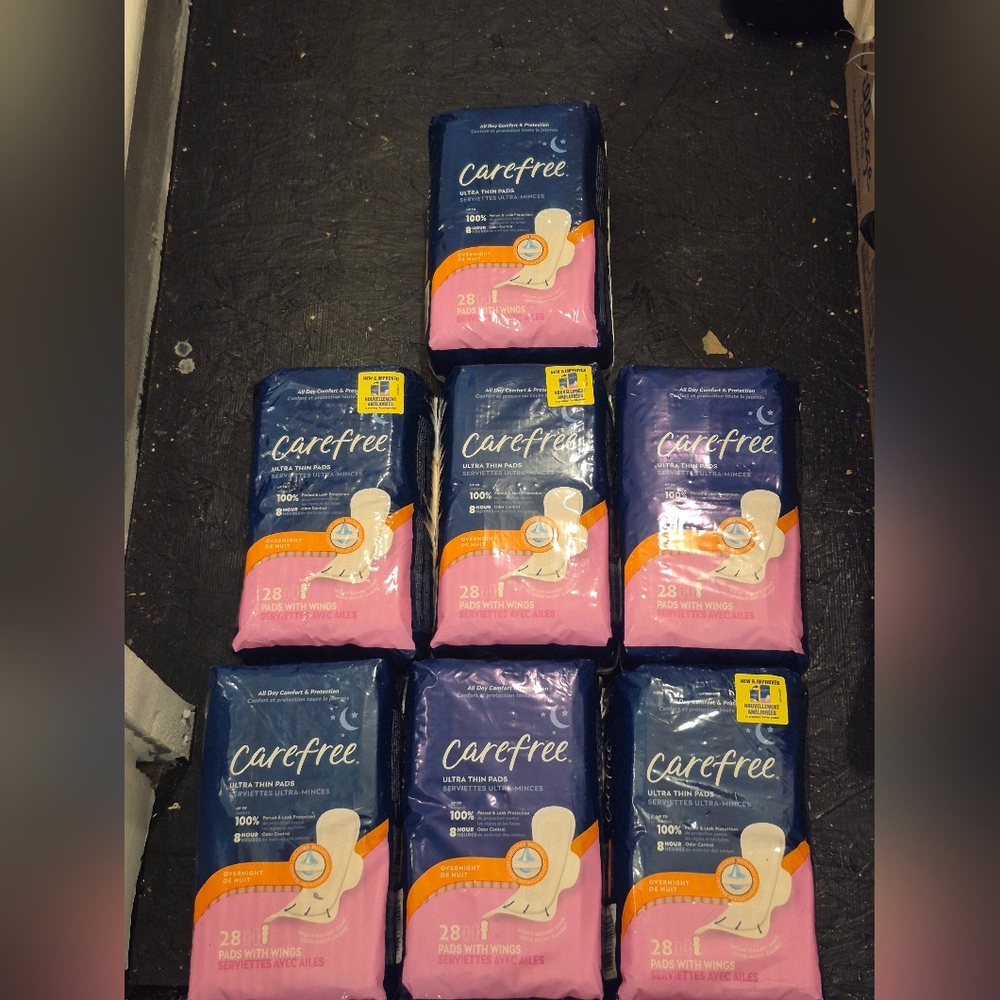 Lot Of 7 New Packs Of Carefree Ultra Thin Pads with Wings; Overnight. 28ct X 7